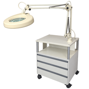 Meuble esthétique professionnel à roulettes avec lampe-loupe articulée